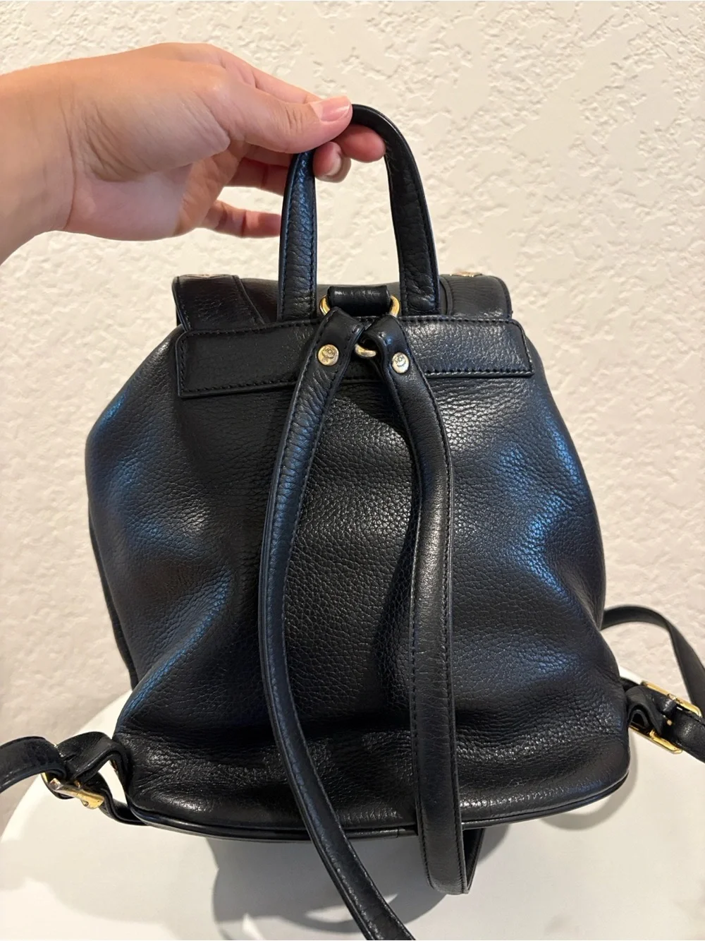 MCM Black Leather Drawstring Backpack with Gold Hardware